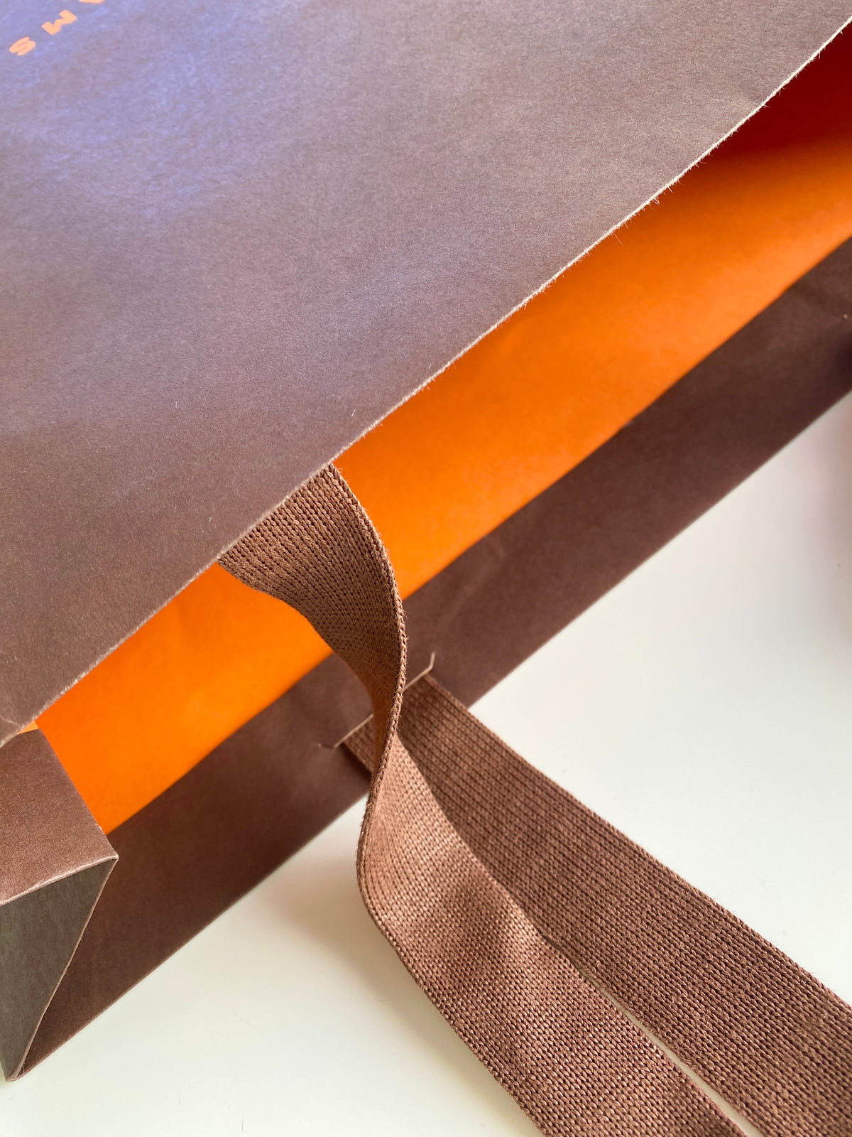 Close up image of brown Custom Bamboo Retail Bag and woven handle