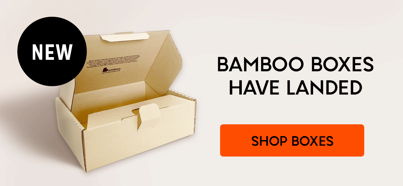 Bamboo boxes with open lids, ready for shopping.