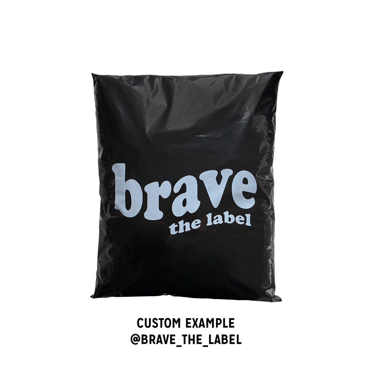 Brave the Label branded custom Better Packaging POLLAST!C black mailer on a transparent background