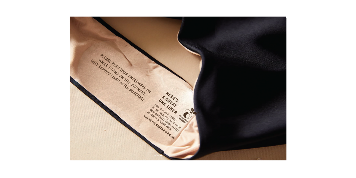 A close-up of a black swimwear bottoms with a Better Packaging hygiene liner.