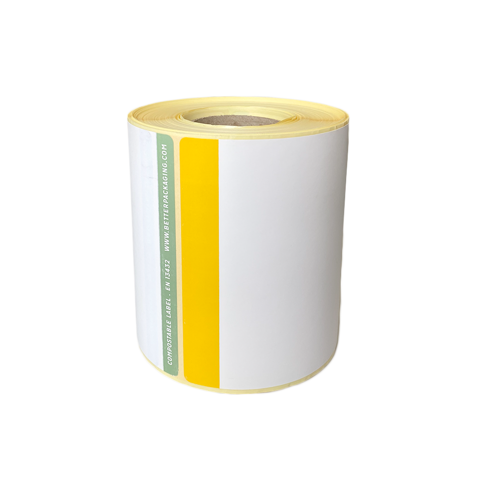 A Better Packaging compostable shipping label on yellow and white thermal paper roll on a transparent background