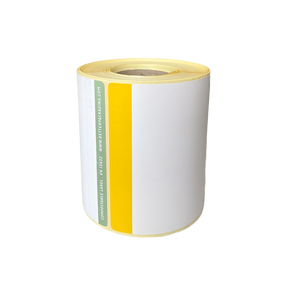 A Better Packaging compostable shipping label on yellow and white thermal paper roll on a transparent background