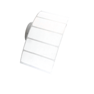 A roll of Better Packaging white compostable thermal shipping label on a transparent background